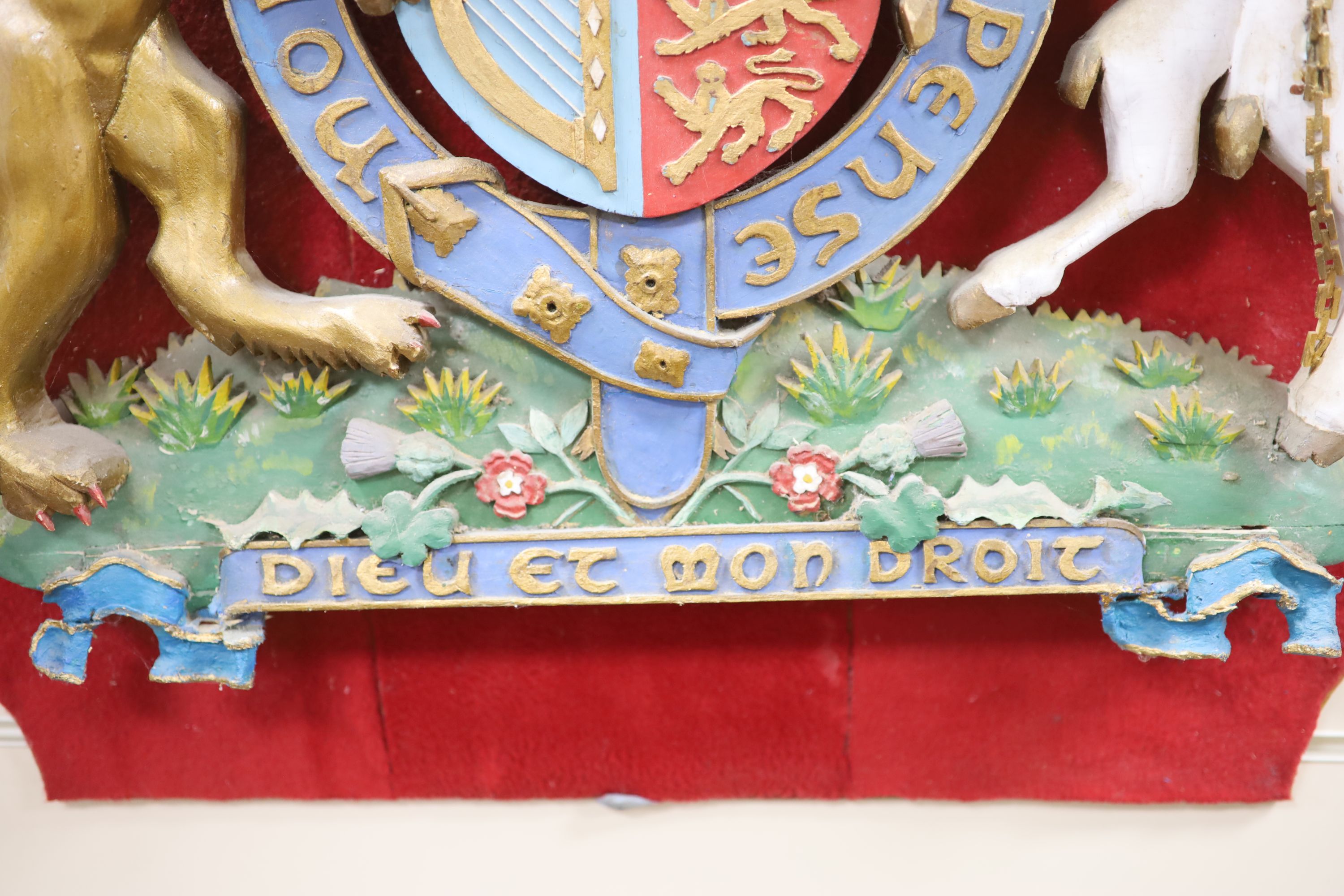 A carved wood and polychrome painted Royal armorial crest, overall length 84cm